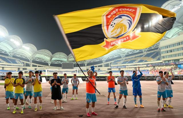 九游体育-青岛西海岸上演草根逆袭奇迹 从成立到中超仅7年